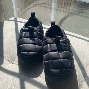 Youth North Face indoor/outdoor slippers.